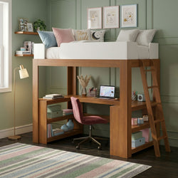 Modern wooden loft bed with built-in desk and ladder in a pastel bedroom, green paneled wall, pink velvet chair, decorative pillows, framed line-art prints and laptop study nook