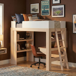 Loft bed with built-in desk and ladder in natural wood, storage shelves, leather swivel chair, pillows and framed wall art in a modern kids bedroom