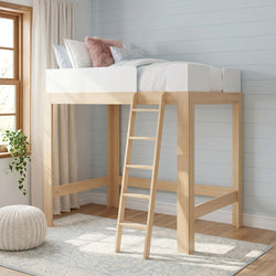 Light wood loft bed with ladder, white bedding and pink faux-fur pillow against pale blue shiplap wall in cozy modern kids' bedroom